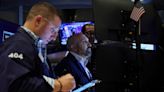 Stocks slide as corporate results spur recession fears