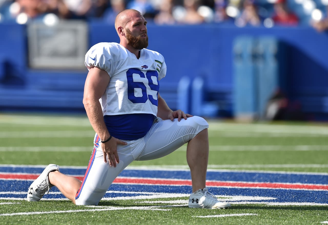 Buffalo Bills’ Reid Ferguson stands out in wedding party full of Miami Dolphins jerseys