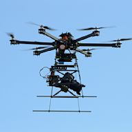 A drone with six rotors arranged in a hexagonal pattern. Offers greater stability and lifting capacity than quadcopters. Used for aerial photography, videography, and industrial inspections.