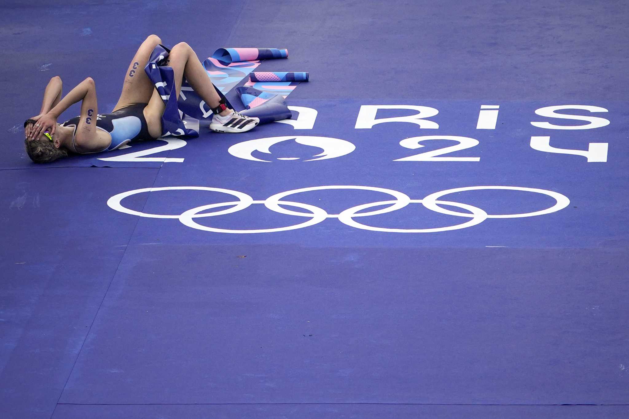 Beaugrand of France wins women's Olympic triathlon after concerns about water quality in Seine