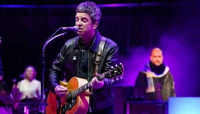 Why has Pep Guardiola appeared on stage with Noel Gallagher? The Man City boss was spotted behind the rockstar at a Royal Albert Hall charity gig last night, but the former ...