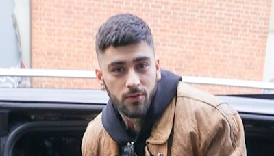 Zayn Malik arrives at a meet and greet in London after first solo gig