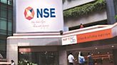 Indices trade with modest gains; realty shares advance