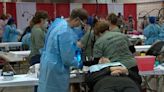 Free dental, vision, hearing clinic not seeing any additional patients after reaching capacity