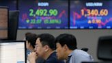 Stock market today: Asian shares mixed after interest rates-driven sell-off on Wall Street