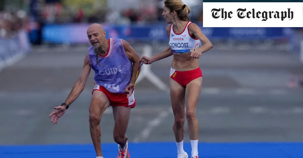 Paralympics marathon runner stripped of medal after helping guide with cramp metres from finish