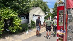 1 hurt when truck crashes into building in Neville Township