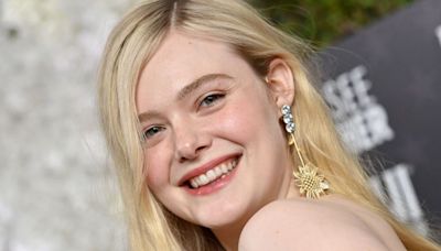 Elle Fanning does naked dressing meets boho chic and woah!