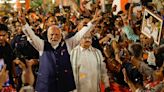 India's Modi set for a record third term, but wings clipped