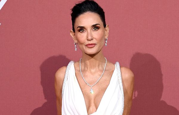 Demi Moore Takes the Plunge in Elegant White Gown (with Thigh-High Slit!) as the Host of 2024 amfAR Gala at Cannes