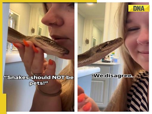 Viral video: 'Reptiles make pretty cool...': Woman pampers her pet python, internet is stunned, WATCH