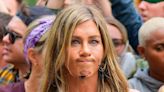 Jennifer Aniston looks FURIOUS when oil is thrown on her