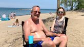 A summer preview? People flock to Presque Isle beaches with near-record high temps