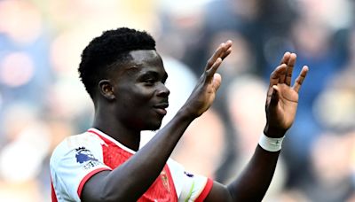 Saka shares relief as Arsenal hold off Spurs fightback