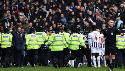 Police seek 25 men over FA Cup disorder