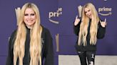 Avril Lavigne Gets Distressed in Ripped Jeans and Torn Hoodie for ACM Awards 2024 Red Carpet