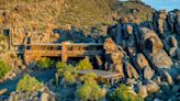 Mountain home for sale spans a ‘dramatic canyon’ in Arizona. See it nestled in rocks