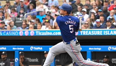 Corey Seager homers twice as Rangers end skid, top Twins