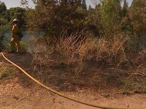 Person of interest detained after grass fire near American River in Sacramento County