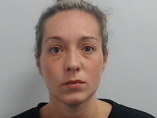 The moment paedophile teacher Rebecca Joynes smirks after buying teenage victim £345 Gucci belt