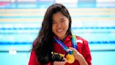 Yip Pin Xiu wins two backstroke golds for the third straight world championships