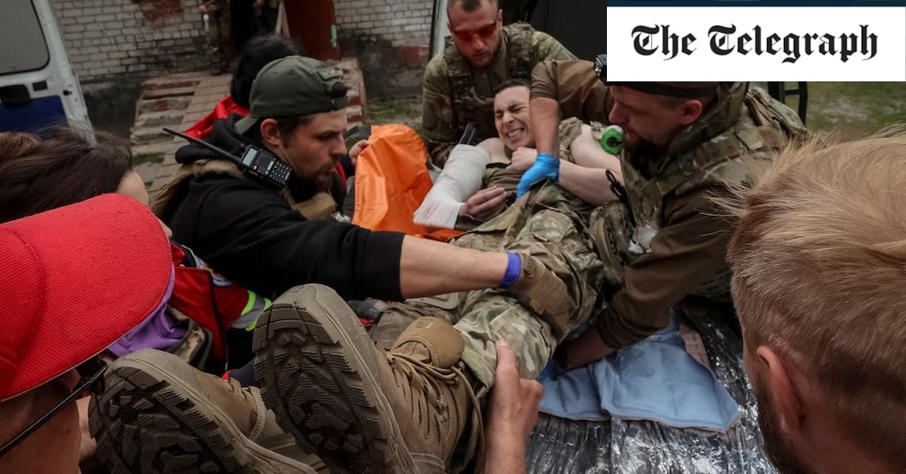 Ukraine reinforces border as thousands flee invading Russians