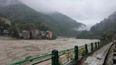 Flash floods in northern India have killed 8 people and left 23 soldiers missing