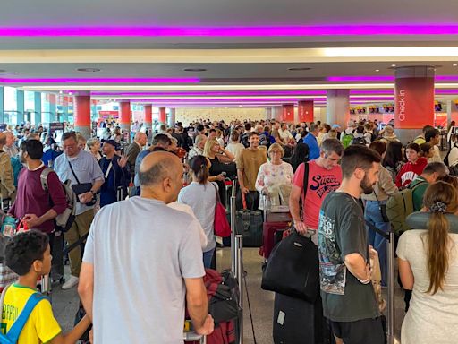 Chaos as dozens more flights cancelled - while TUI axes entire package holidays