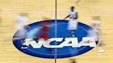 NCAA votes to approve payments to student athletes