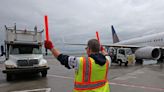 An airport truck driver says she has to fill in as cabin cleaner and gets 7 minutes to clean a plane. It shows how a crippling staff shortage is taking its toll on US airport workers.