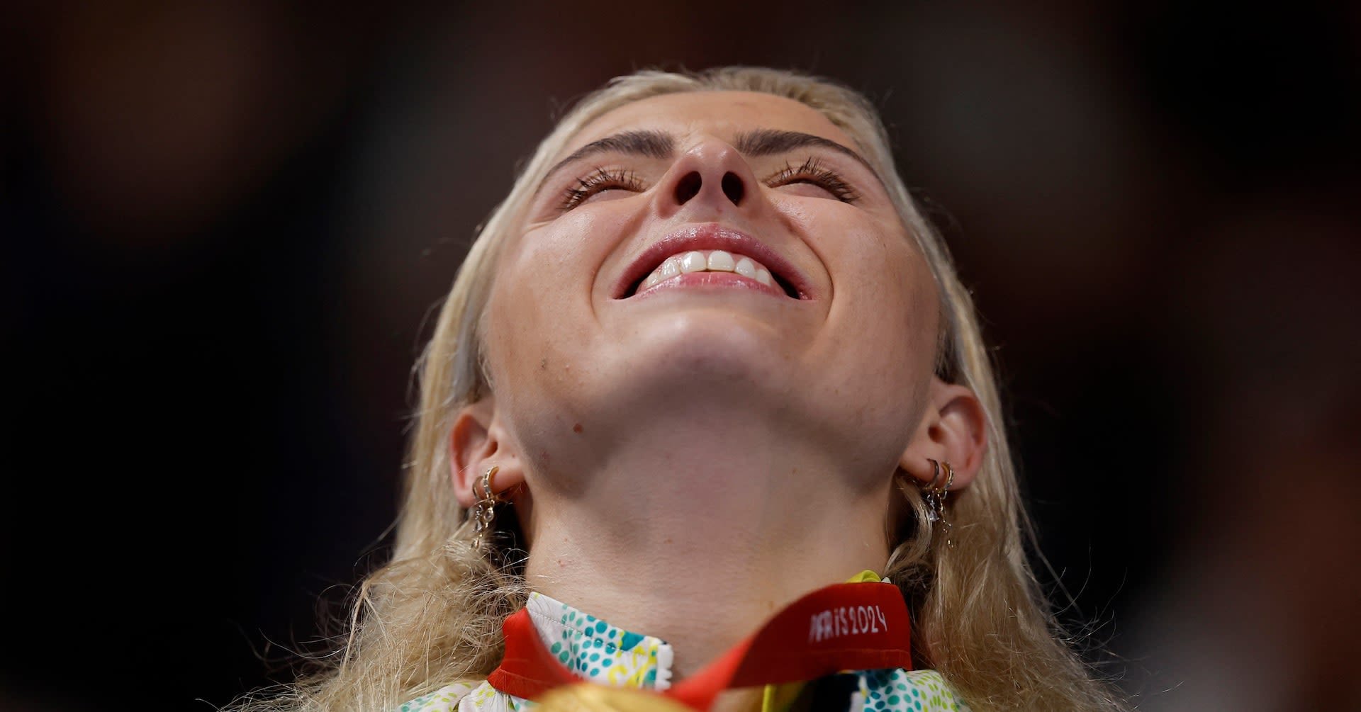 Australian swimmer celebrates gold after fortune teller prediction