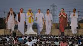 AP PHOTOS: Colorful roadshows and rallies mark India's election season before voting starts Friday
