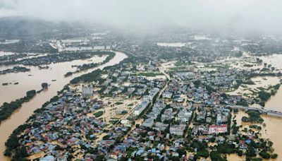 Vietnam typhoon death toll nears 200 with 125 still missing in flash floods and landslides