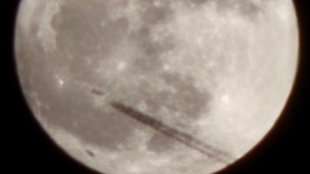 Mysterious object flying in front of the moon caught on camera