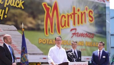 Gov. Josh Shapiro breaks bread with Martin’s Potato Rolls, one of Doug Mastriano’s top supporters