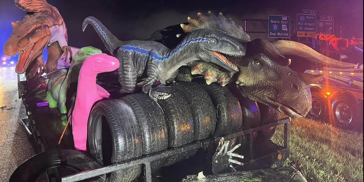 Truck hauling life-sized dinosaurs crashes on highway after storm