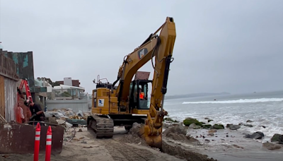 Billionaire accuses billionaire of using public Malibu beach as ‘personal sandbox’ for $30 million home