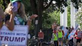 Donald Trump visits New Orleans as supporters and protesters spar verbally on street