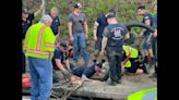 Missing man was trapped for a day in 24-inch pipe under Georgia highway, county says