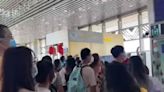 Angry tourists shout at guards after Chinese airport goes into lockdown