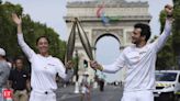 Who is carrying the Olympic torch through Paris? A BTS star, a garbage collector and more