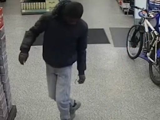 Moment clumsy thug flees shop after dropping knife in front of staff