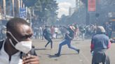 Kenyan police crack down on tax protests; Parliament set on fire