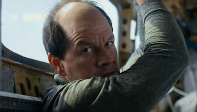 ‘Flight Risk’ Trailer: Mel Gibson Directs Mark Wahlberg as a Balding Hit Man in High-Flying Action Thriller