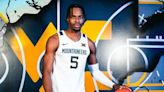 Transfer Okani gives West Virginia versatility on both ends