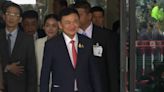 Thaksin Shinawatra: Moment exiled former prime minister returns to Thailand with children after 17 years