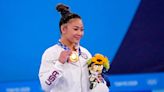 How Suni Lee, Tokyo Olympics all-around winner, represents a refugee community, the Hmong
