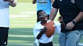 The RECing Crew joins North Augusta football team for summer clinic