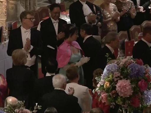 The Emperor of Japan and the Duke of Edinburgh process into the Great Hall