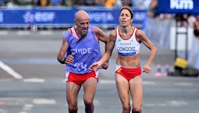 Paralympic Marathoner Loses Medal After Helping Her Guide Yards From Finish